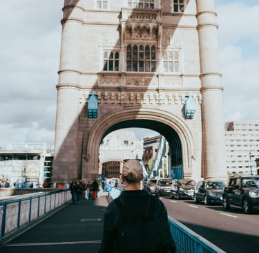 a person walking across a bridge over a bridge