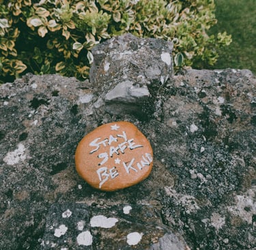 a rock with writing on it on a rock