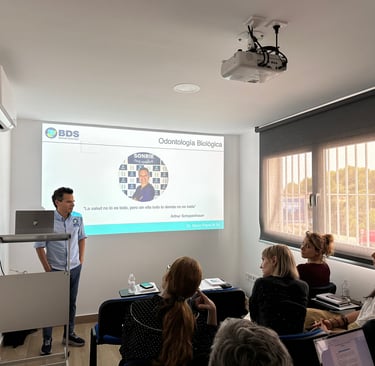 a man standing in front of a presentation on a presentation