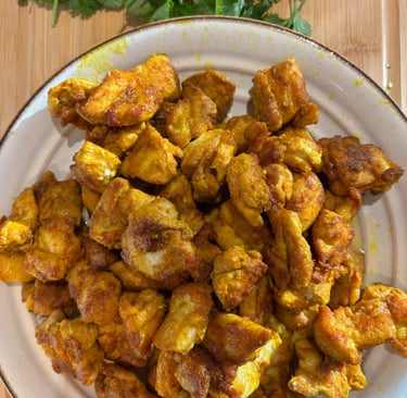 chopped and browned chicken thighs removed from pan