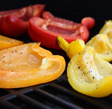 bell peppers grilling on barbecue