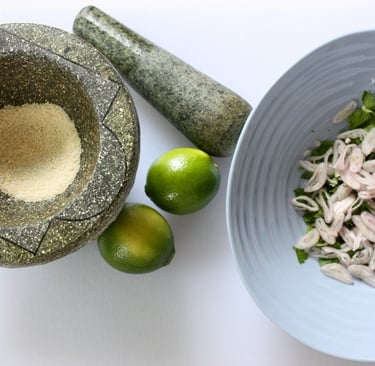 mortar and pestle with uncooked rice