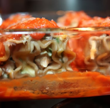 chicken cheese lasagna noodles covered in basil tomato sauce