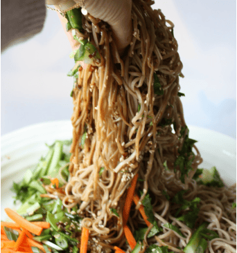 mixing Potluck soba salad
