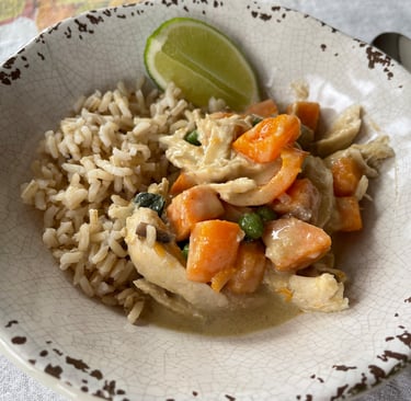 sweet potato and chicken curry with brown rice and lime