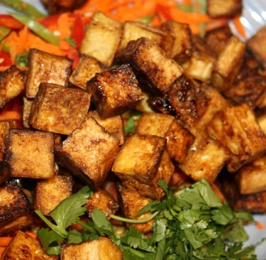 ingredients for Thai tofu salad, carrots, peppers, snow peas, peanut dressing