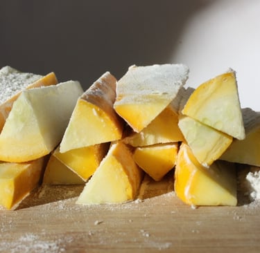 quartered zucchini covered in flour