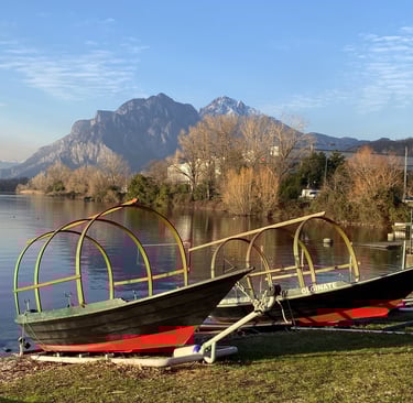 Traditional Lake Como boats called 'Lucie' floating on the water