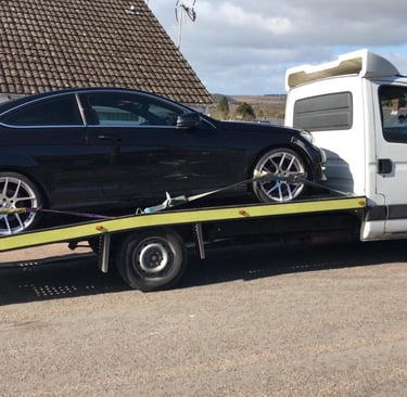 a car being trasnported in uk