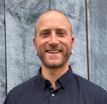 head shot of Harrison Blum smiling