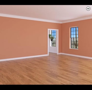 The interior of a room transformed with fine interior carpentry, paint, and new flooring.