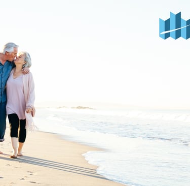 Retired couple enjoying a walk on a white sand beach in Zambales, promoting a peaceful retirement li