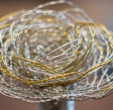 a wire wrapped wire wrapped in wire and a wire wrapped around a wire wrapped flower