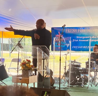 Pastor Brian from Valleyview Victory Church Bringing the Word of God at the tent meeting Sunday Morn