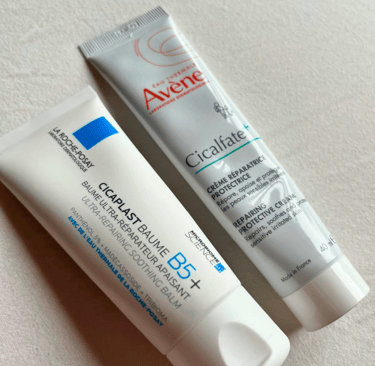 La Roche-Posay Cicaplast Balm B5 and Avène Cicalfate+ repair creams on white background