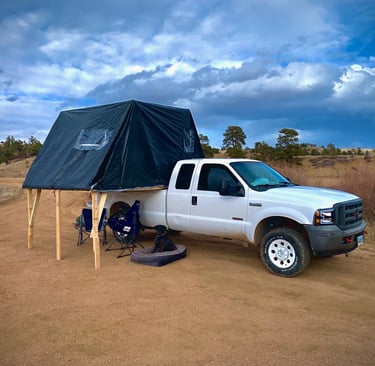 Truck-Bed Mounted Overland Tent deployed on a 2005 f250