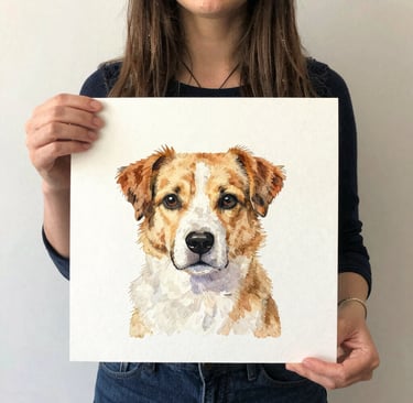 A framed gouache painting of a joyful golden retriever displayed on a minimalist white wall.