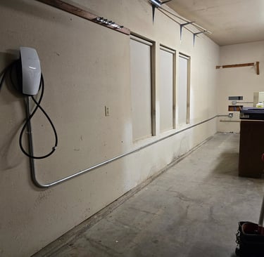 Wall mounted Tesla Gen 3 Wall Connector with surface mounted 3/4 in. EMT conduit