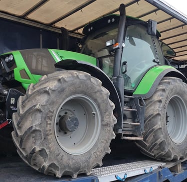 Preis für Traktortransport