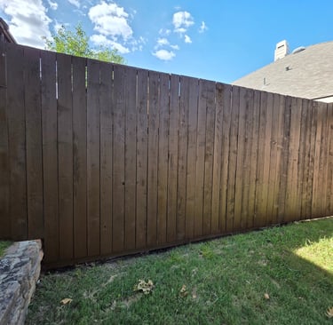 after picture of a fence cleaning