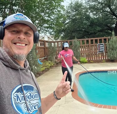 pressure washing a pool deck with the family