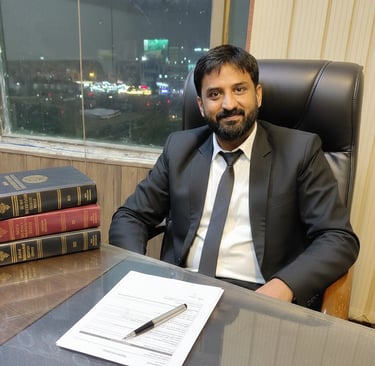 Syed Muhammad Ali Rizvi, legal consultant in Islamabad, pictured in a professional office setting.