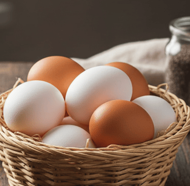 a basket of eggshells in a basket on a table