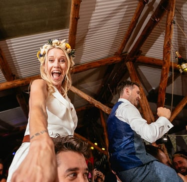 a bride and groomsmid dancing at a wedding happy they chose the right photographer