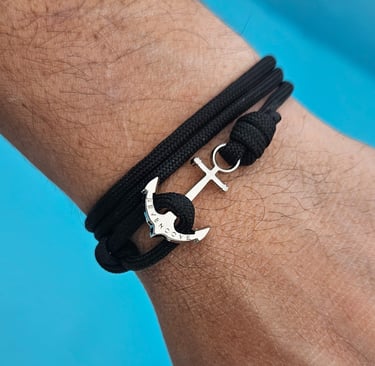 a man's bracelet with a anchor anchor on it