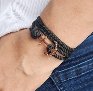a woman's handmade bracelet bracelets with a anchor anchor
