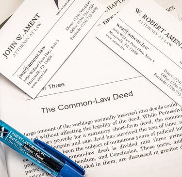 a pen and papers on a table
