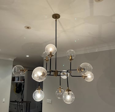 a chandelier with a chandelier hanging from the ceiling