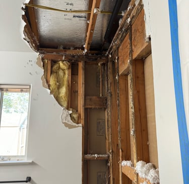 Roof leak damage. Repaired roof and drywall. Water damage.