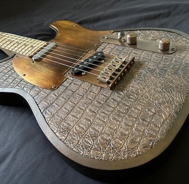 Sobek's Tele Telecaster style dark industrial guitar. Angle front view.