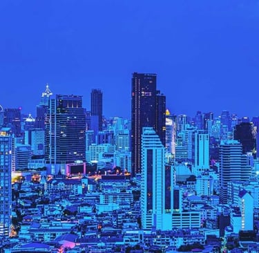 a city skyline view of a city at night