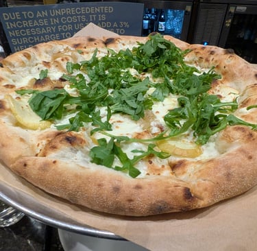gourmet pizza with arugula