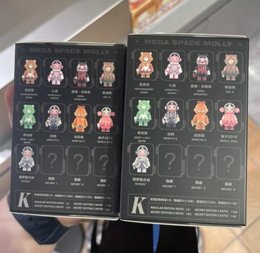 a person holding a two minifigure blind boxes