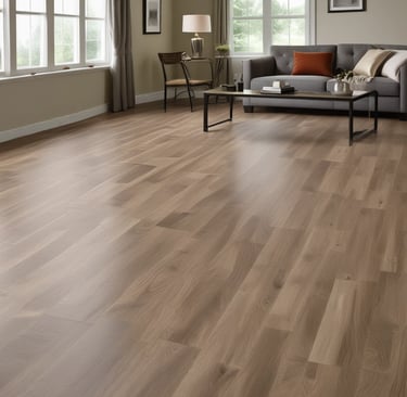 Four wooden planks are lying on a wooden floor. The planks have a natural, rustic finish, and two of them have screws partially embedded. The floor has a variegated pattern with a mix of light and dark brown tones.