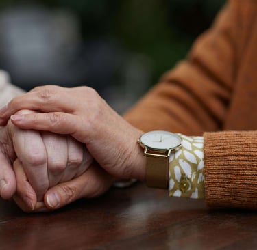 two people holding hands