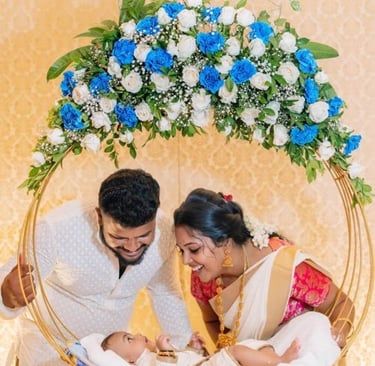 a man and woman in a basket with flowers