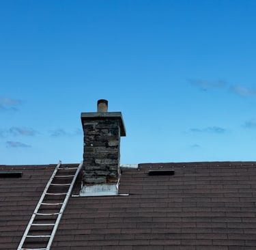 masons ladder to make chimney repairs