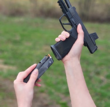 Women reloading defensive firearm.