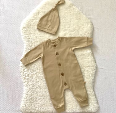 a classy baby's outfit is shown, colors are bright and beautiful