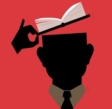 Uomo con un libro in testa che rappresenta When Coffe and Kale Compete