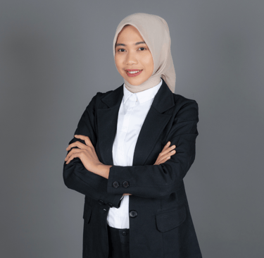 a woman in a suit and hijab