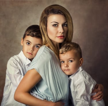 Fine art family portrait session in Sydney featuring mother and two sons in studio setting
