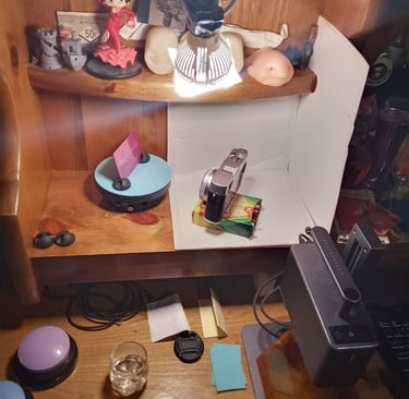 The full kit - the "photo booth" fit into a section of dresser, shot of gin, laser burner.