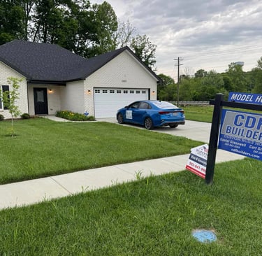 a home with a sign that says, we are selling a home