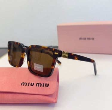 Miu Miu Leopard Sunglasses