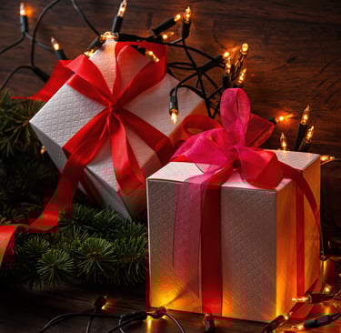 Christmas background with gift boxes and lights
